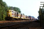 EL, Erie Lackawanna, GP7s 1241-1232-1239-1238 head eastbound down the ex-Erie mainline to make its setout and pickups at Paterson, NJ before heading back west to Suffern NY. We are at Ridgewood Jct, Glen Rock, New Jersey. September 3, 1977. 